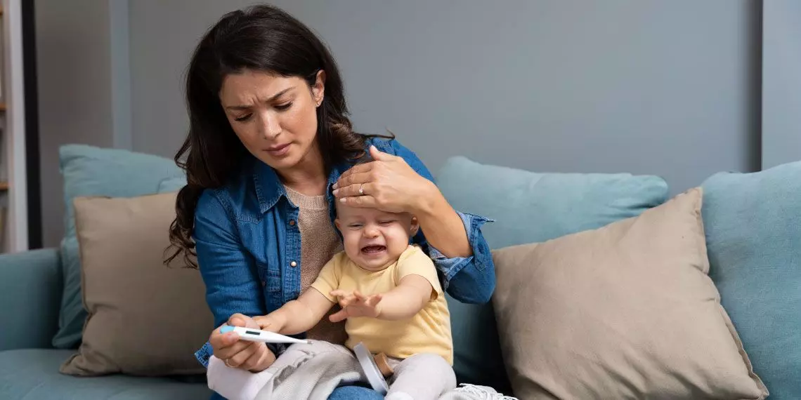 FeaturedImage-mom-checking-babys-fever-home-care-crystal-mn.jpg