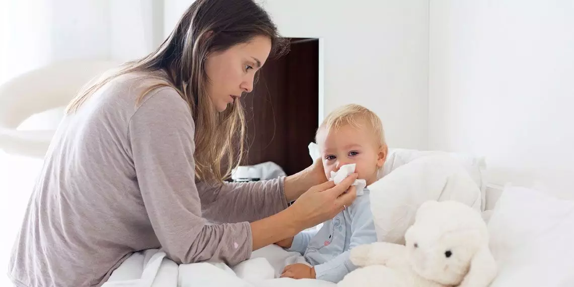 Image1-mom-wiping-babys-runny-nose-home-care-plymouth-mn.jpg