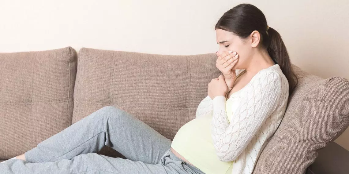 cough-during-pregnancy-woman-covering-mouth.jpg