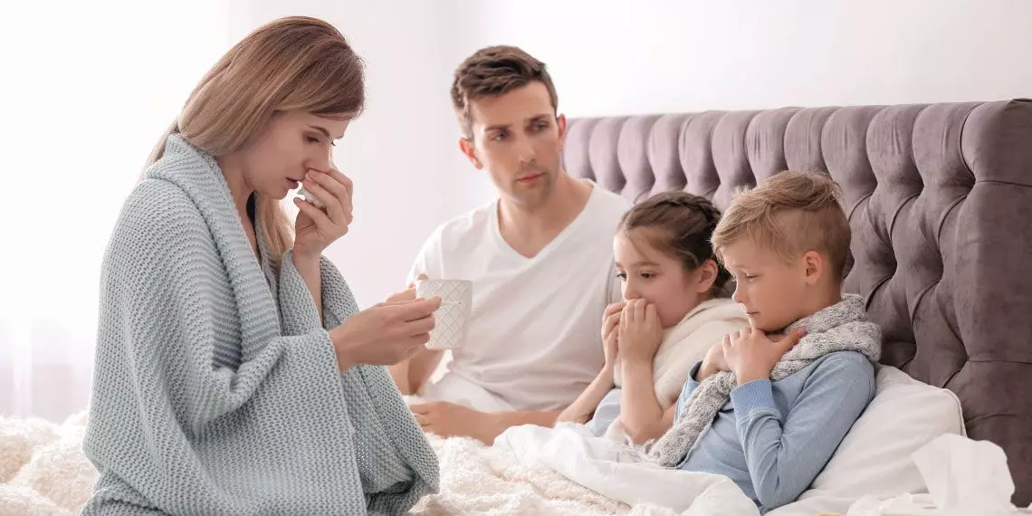 Image3-family-sick-in-bed-with-cold-symptoms.jpg