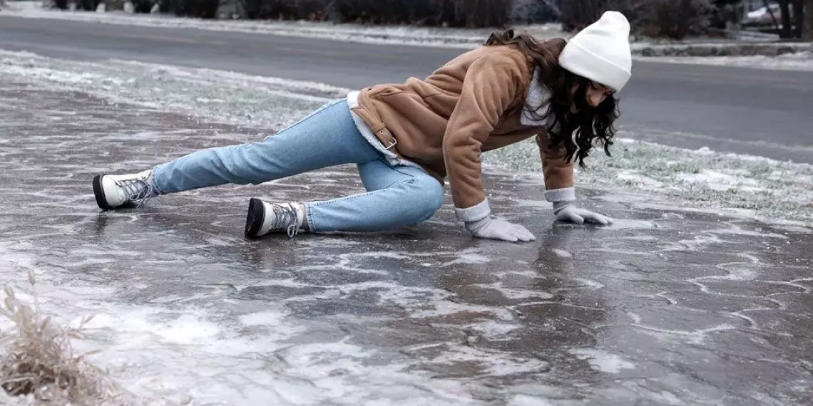 Slipping on sidewalk due to icy conditions