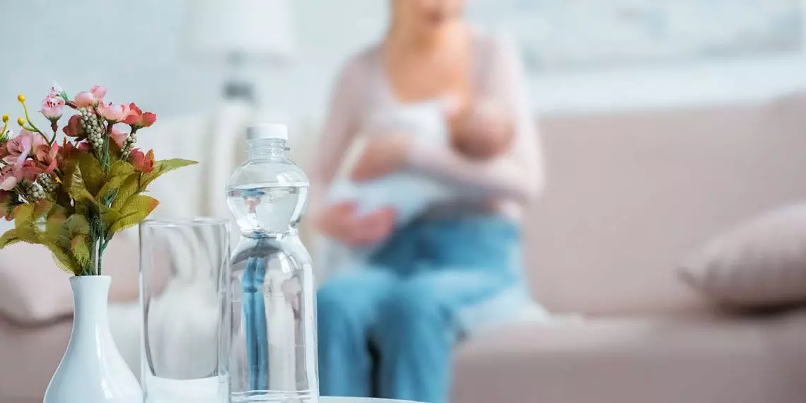 Water-bottle-near-a-breastfeeding-mom-showing-the-importance-of-hydration-during-nursing.jpg