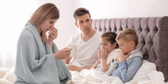 FeaturedImage-Family-Sick-In-Bed-With-RSV.jpg