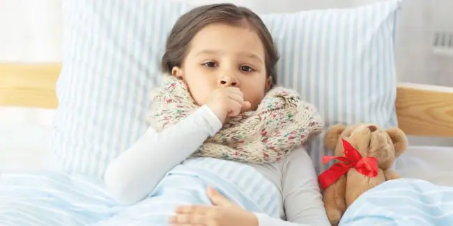 young-girl-in-bed-with-cough.jpg